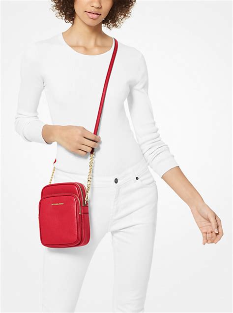 Jet Set Travel Small Pebbled Leather Crossbody Bag .